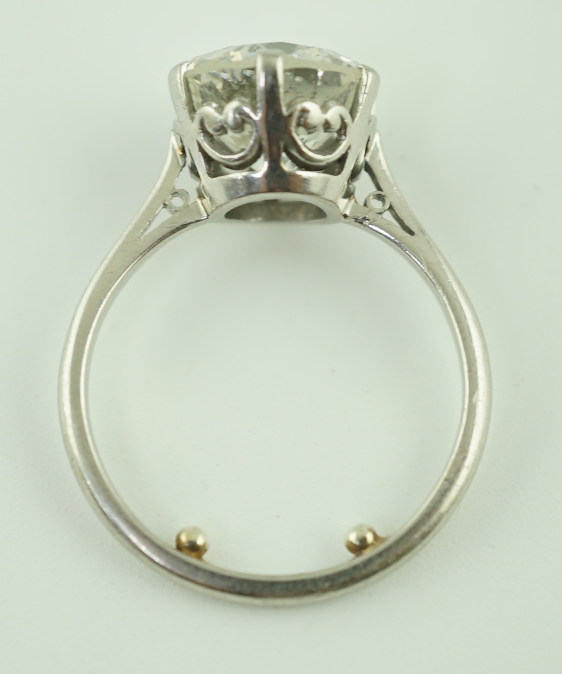 A mid 20th century platinum and solitaire diamond set ring